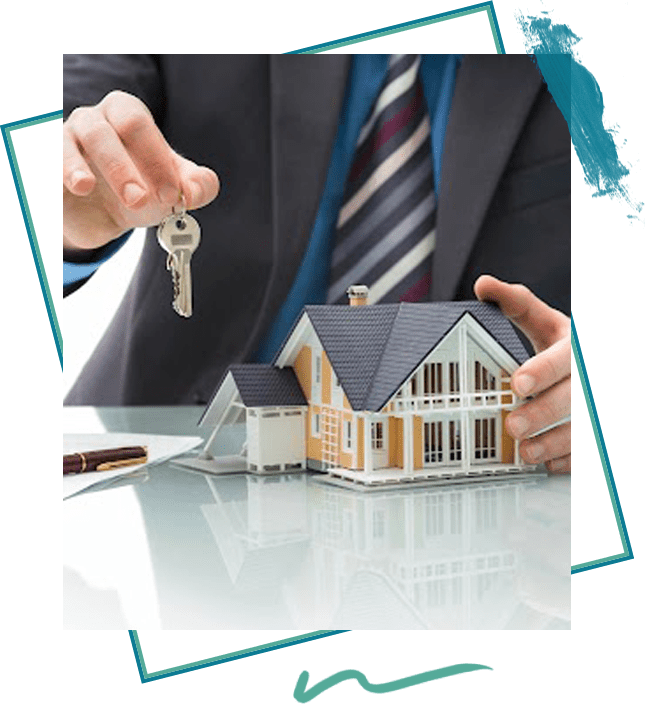 A man holding out his keys to a house.